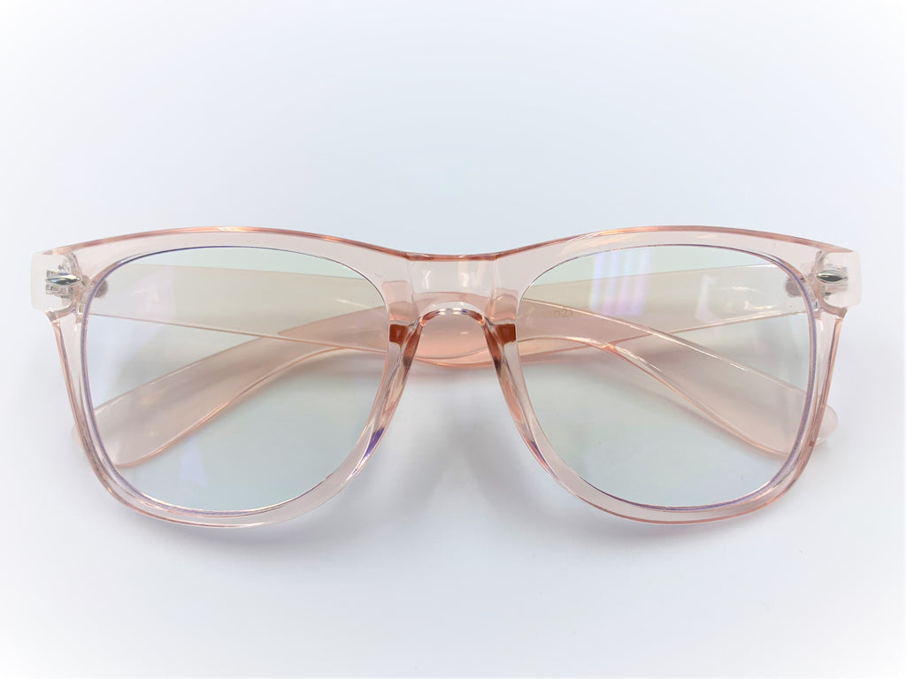 Blue light filtering glasses with translucent pink pastel frames